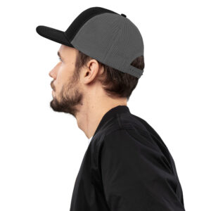 Trucker cap black grey left side man